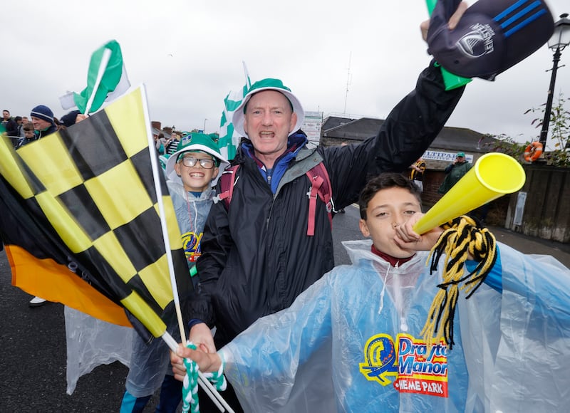 Paul McElroy with sons Cian and Ciaran, aged 10 and 11, who flew home to Laois from London for the boys' first All-Ireland hurling final at Croke Park. Photograph: Alan Betson
