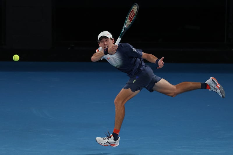 Australia's Alex de Minaur hits a return against against USA's Alex Michelsen during their men's singles match. Photograph: Adrian Dennis/AFP via Getty Images