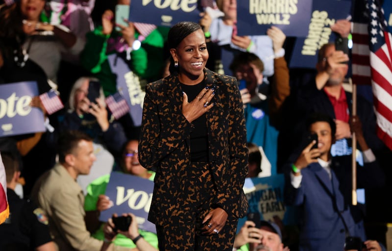 Former first lady Michelle Obama arrives to a Kamala Harris campaign rally at the Wings Event Center in Kalamazoo, Michigan. Photograph: JEFF KOWALSKY/AFP via Getty Images