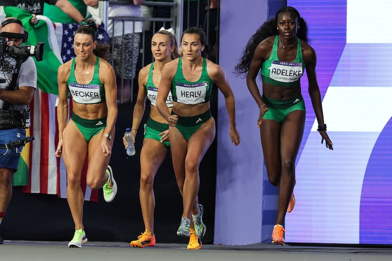 Ireland’s Sophie Becker, Sharlene Mawdsley, Phil Healy and Rhasidat Adeleke make their entrance at the Paris Olympics. Photograph: Morgan Treacy/Inpho