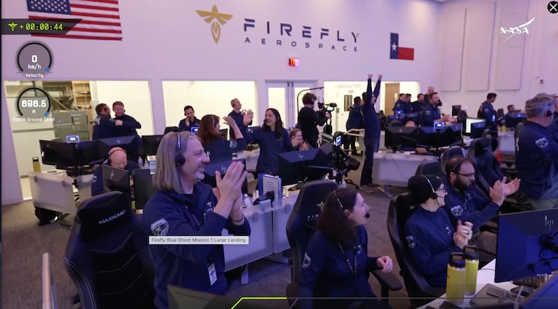 Staff at mission control celebrate as the lander Blue Ghost touches down on the moon. Photograph: Nasa/Firefly Aerospace/AP