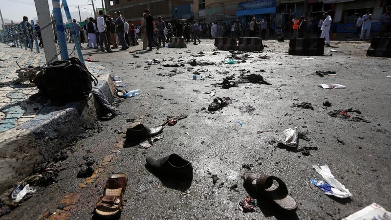 The shoes of victims are seen at the site of the blast in Kabul, Afghanistan. Photograph: Omar Sobhan/Reuters