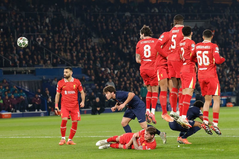 Liverpool's defensive wall attempt to block a PSG free kick during the game in Paris. Photograph: Geoffroy van der Hasselt/AFP via Getty Images