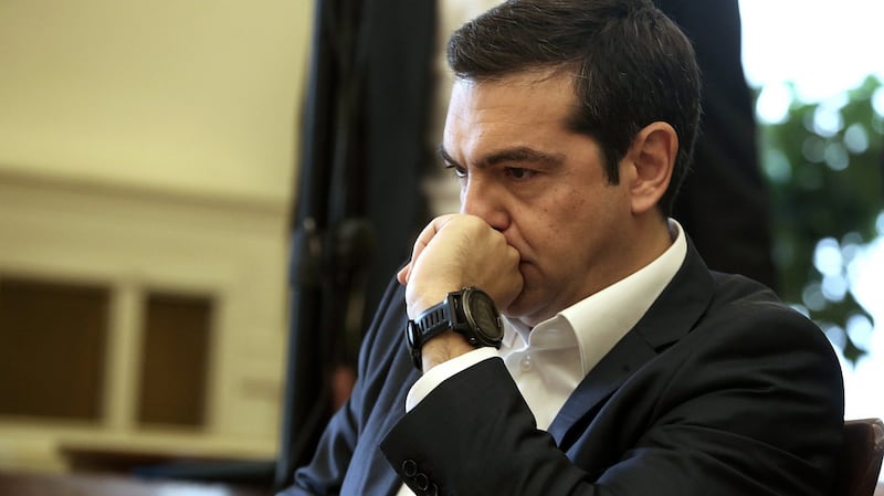 Greek prime minister  Alexis Tsipras: between a rock and a hard place. Photograph: Simela Pantzartzi/EPA