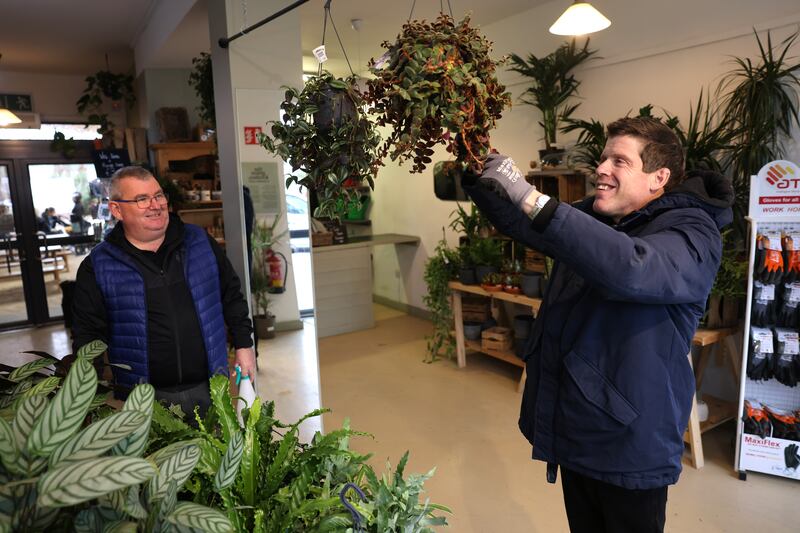 Ronan Howard, right, working in the Garden Shop, with Joe Mason, chief executive of Walk. Photograph: Dara Mac Dónaill