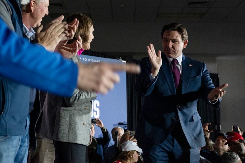 Florida governor Ron DeSantis attends a 'watch party' during the Republican presidential caucuses in Des Moines, Iowa, on Monday night. Photograph: Christian Monterrosa/AFP via Getty Images