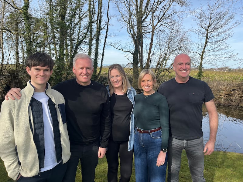 Pictured in the back garden of their family homestead in Lydiate, near Liverpool: the Clohertys - Patrick, Mike, Katie, Mary and Sean jnr