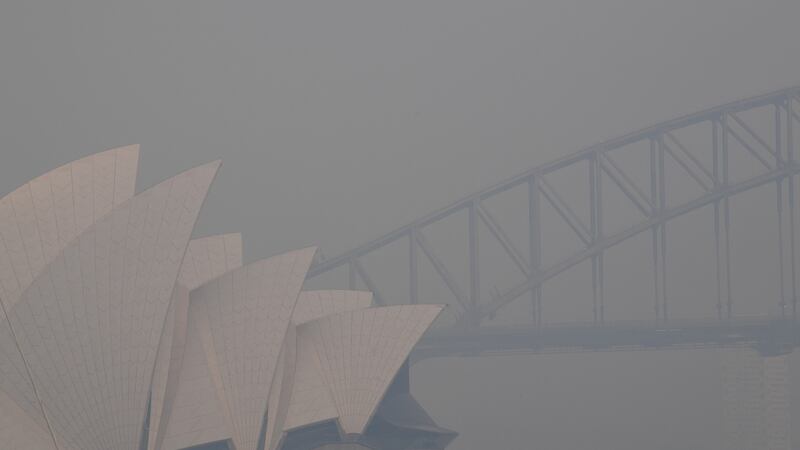 Thick smoke hangs in the sky in Sydney on Thursday. The smoke comes from the Gospers Mountain fire north west of Sydney, which has been burning for over a week now, and has burnt more than 160,000 hectares of land. Photograph: Dean Lewins/EPA