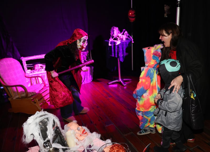 A baseball bat wielding Chanel Kudryova, left, a student of Maryfield College, was among the cast of scary folk at the Haunted Hall of Horrors event. Photograph: Bryan O’Brien
