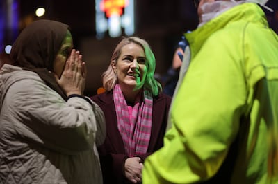 Lorraine O'Connor, who founded the Muslim Sisters of Éire charity in 2010, speaks with the Dublin Lord Mayor Emma Blain and Sinn Féin Dublin city councillor Daithí Doolan at the Friday night soup kitchen at the GPO. Photograph: Chris Maddaloni