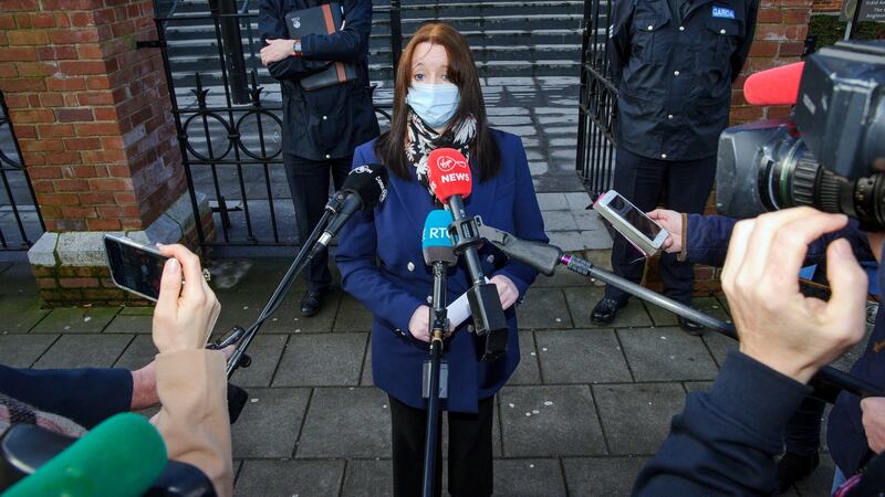 Harassment victim Una Ring from Roscarberry  at Cork Circuit Criminal Court, flanked by Sergeant John Sharkey and Insp Eoghan Healy.Photograph: Daragh Mc Sweeney/Cork Courts Limited