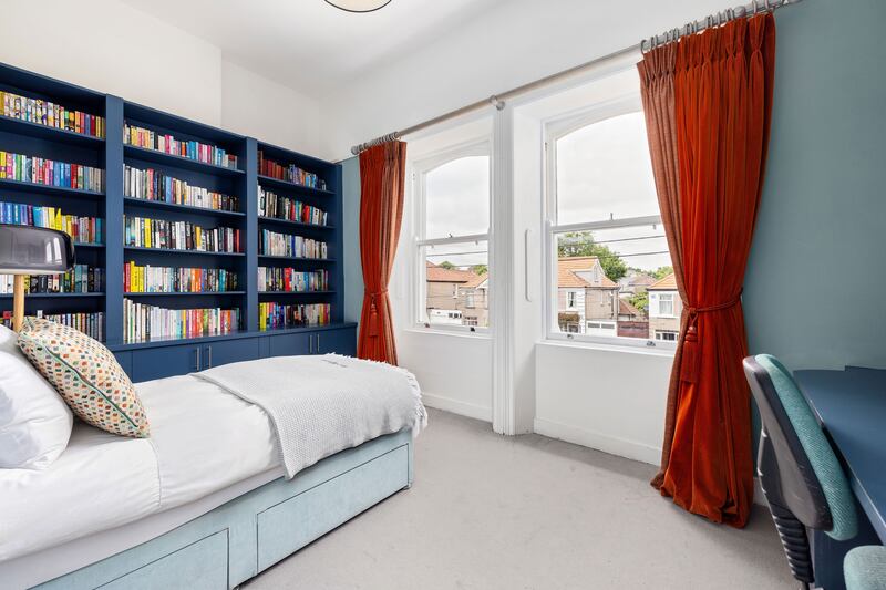 Bedroom with shelving units