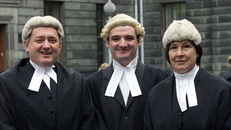 Mr Justice Adrian Hardiman and his wife retired Circuit Court judge  Yvonne Murphy with their son Eoin, when he was called to the Bar in 2002.