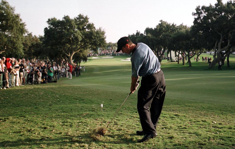 Mike Weir of Canada hits his second shot on the 18th hole during the final round on his way to victory in the World Golf Championship at Valderrama in 2000. Photograph: Stuart Franklin/Allsport