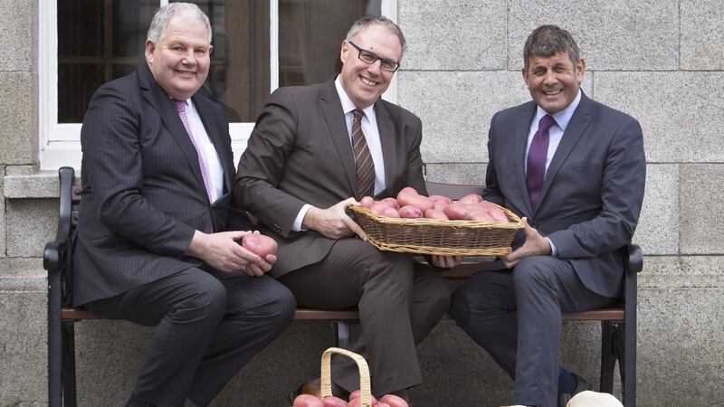 President of the Irish Potato Federation, Michael Hoey, 	president of the World Potato Congress, Romain Cools, and Minister of State for Food, Forestry & Horticulture, Andrew Doyle TD.