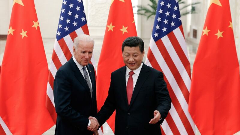 Then US vice-president Joe Biden with Chinese president Xi Jinping  in Beijing in 2013. The growing economic might of China and its increasing authoritarian bent will be a major focus for the incoming US administration. Photograph: Lintao Zhang/New York Times