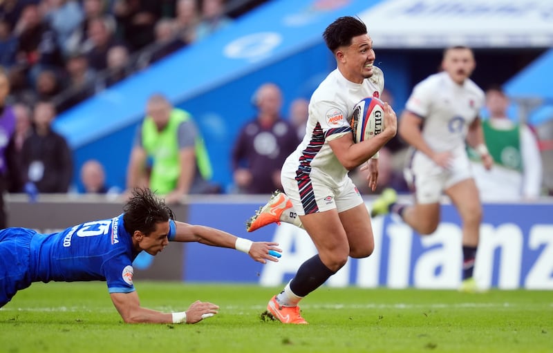 England's Marcus Smith on his way to scoring a try during the Six Nations match against Italy. Photograph: Adam Davy/PA Wire