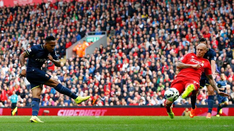 Southampton’s Nathaniel Clyne (left) equalises  against Liverpool  at Anfield. Photograph:  Darren Staples / Reuters