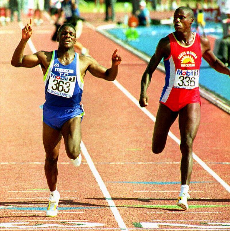 Dennis Mitchell crosses the finish line ahead of Carl Lewis in New Orleans in June 1992. Photograph: Thom Scott/AFP via Getty Images