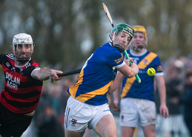 Loughrea’s Ian Hanrahan is tackled by Cappataggle’s Ronan Garvey. Photograph: Evan Logan/Inpho  