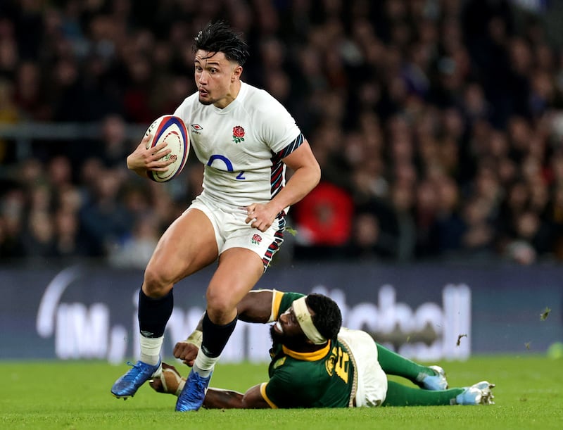 England's Marcus Smith is tackled by South Africa's Siya Kolisi during the Autumn Nations Series match at Allianz Stadium. Photograph: David Rogers/Getty Images