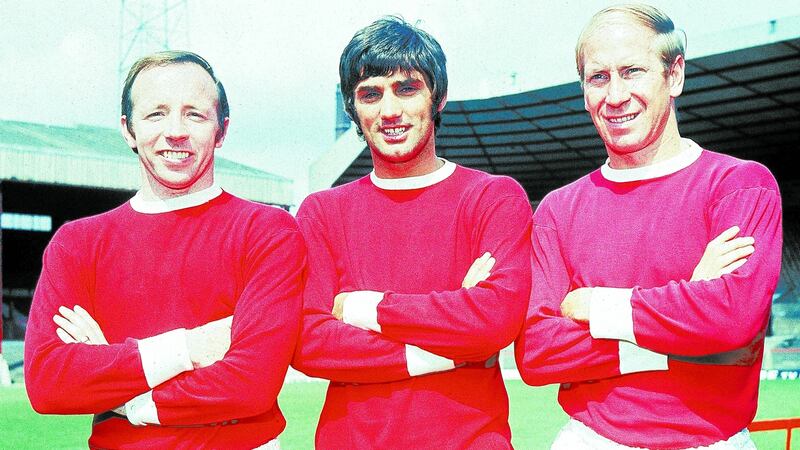 Nobby Stiles, George Best and Bobby Charlton of Manchester United pose for the cameras at Old Trafford in July 1968. Photograph: Allsport Hulton/Archive