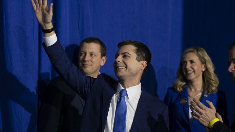 Pete Buttigieg waves to the crowd during a primary night rally in Nashua, New Hampshire on Tuesday. Photograph: Kate Flock/Bloomberg