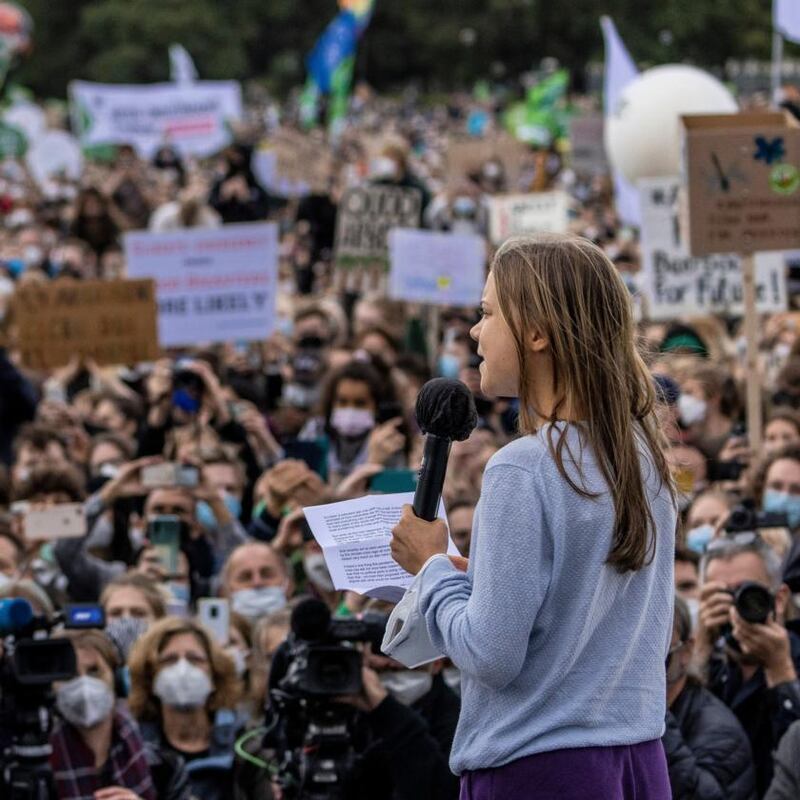 Thunberg speaking at a large-scale climate strike  by Fridays for Future  in Berlin. Photograph: Maja Hitij/Getty