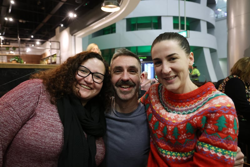 21/12/24 News Paul Dowling is welcomed home from Chicago by friends Leslie Alcock (left) and Aoife Ni Ghloinn  at Dublin Airport Terminal 2 over the weekend as thousands of Irish people living abroad arrived home for Christmas.
Photo: Bryan O’Brien / The Irish Times

