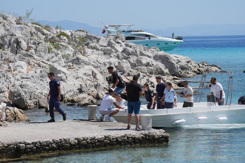 Emergency services on a boat at Agia Marina in Symi, Greece. Photograph: Yui Mok/PA Wire