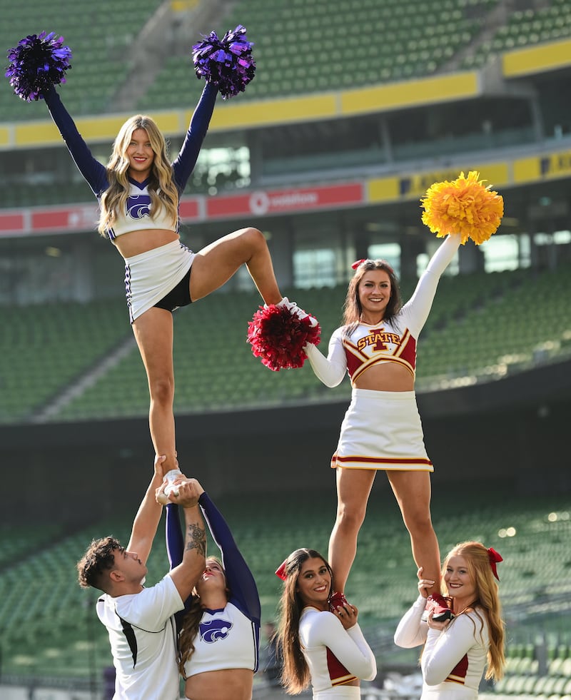 Kansas State University and Iowa State University Cheerleader members at the Aviva Stadium Dublin. Photograph: Ramsey Cardy/Sportsfile 