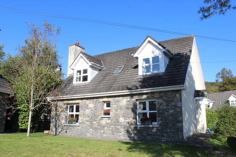 A sizeable, stone-fronted three-bedroom home