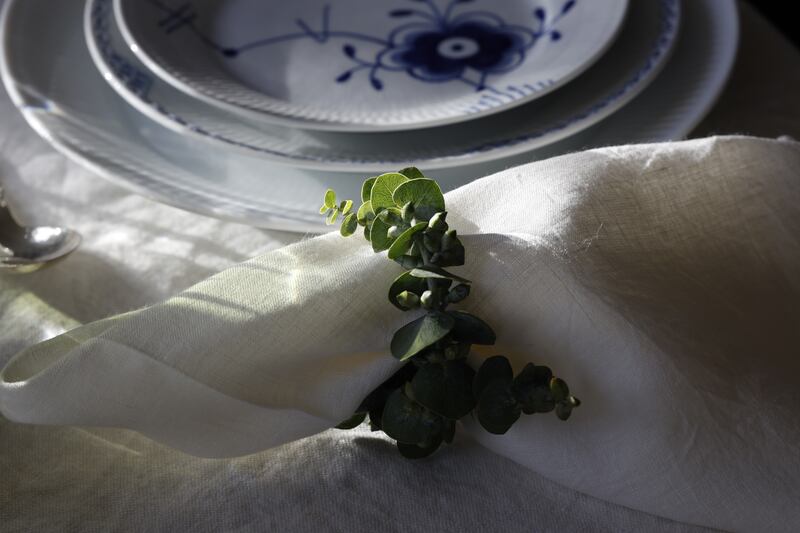 A napkin ring made from a stem of fresh eucalyptus. Photograph: Nick Bradshaw