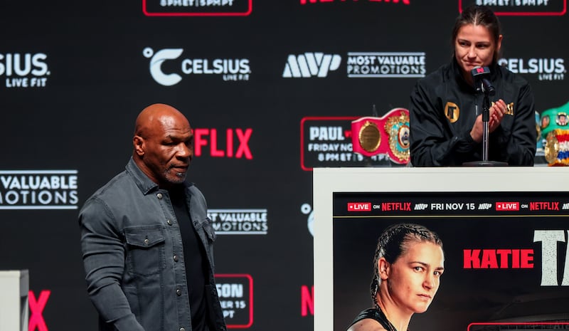 Mike Tyson and Katie Taylor applauds as Mike Tyson arrives at a pre-fight press conference in Texas. Photograph: Ed Mulholland/Inpho
