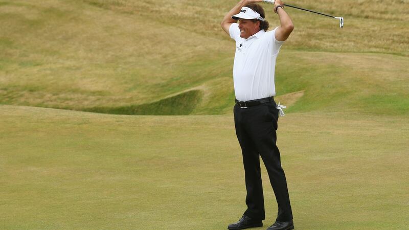 Phil Mickelson reacts to a birdie putt on the 18th hole during the final round of the British Open at Muirfield in July, 2013. Photograph: Matthew Lewis/Getty Images