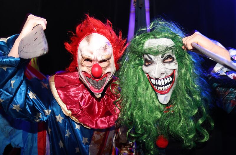 JJ Orange, left, and Michael Barnes, both students at Belvedere College, posing as scary clowns at the Haunted Hall of Horrors event as part of the Big Scream programme for Halloween. Photograph: Bryan O’Brien