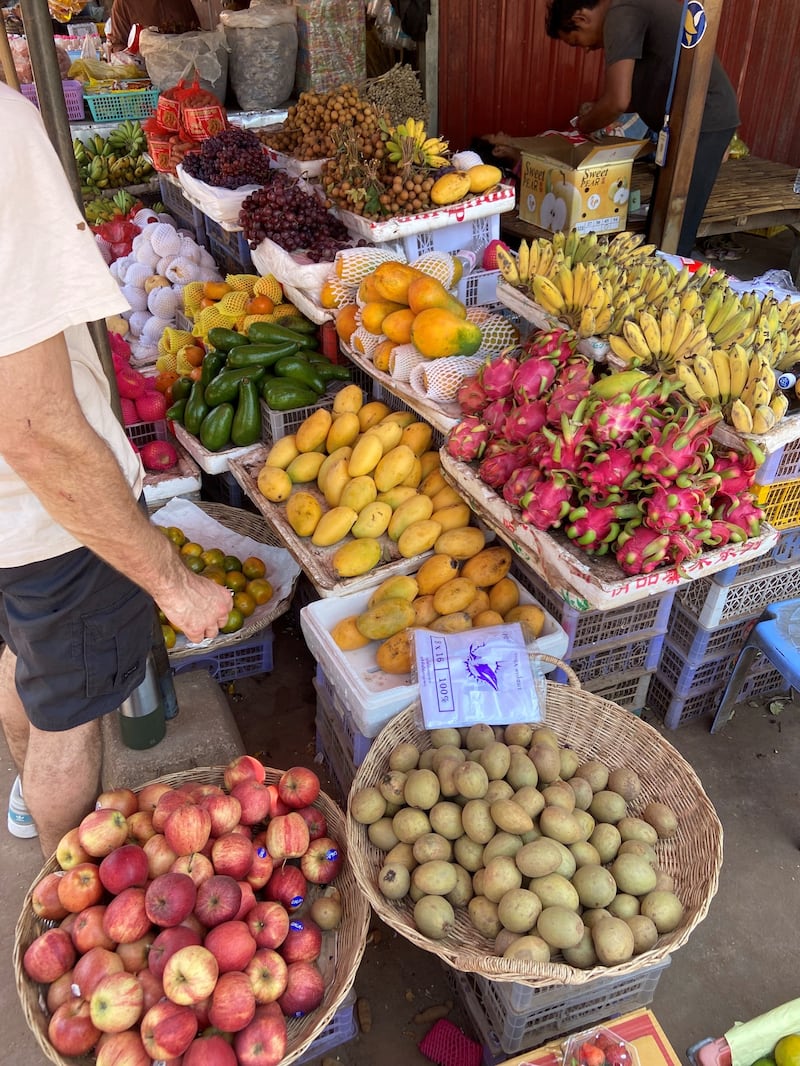 The bustling Rolous Market near the school