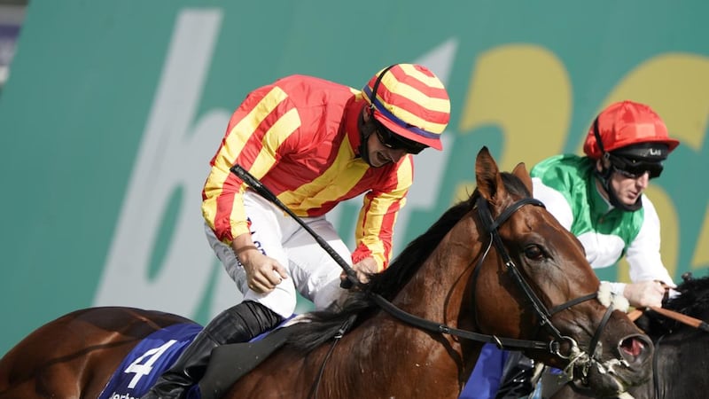 Tom Marquand celebrates Galileo Chrome’s St Leger victory. Photograph:  Alan Crowhurst/Getty