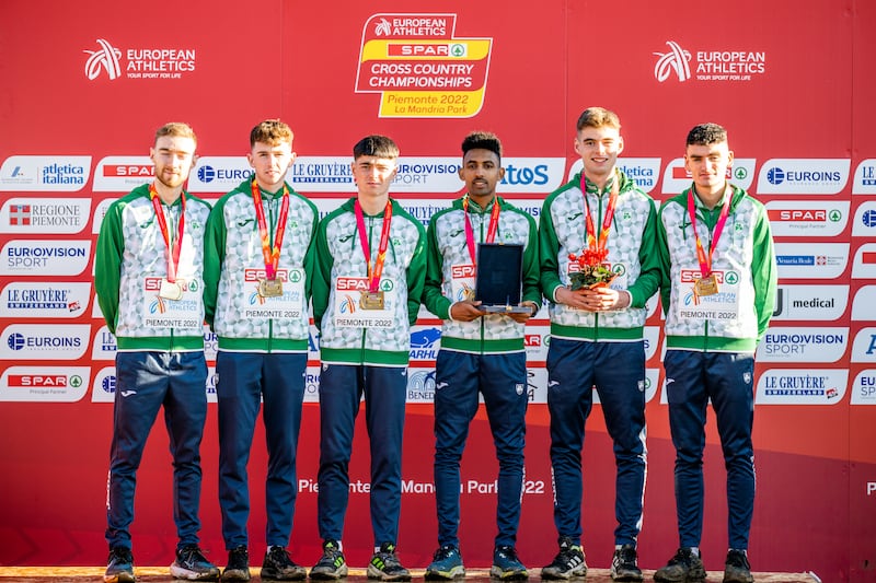  Thomas McStay, Jamie Battle, Darragh McElhinney, Efrem Gidey, Shay McEvoy, and Keelan Kilrehill with their bronze medals after competing in the U23 men's 8000m. Photograph: Sasa Pahic Szabo/Inpho