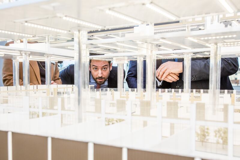 Housing Minister Eoghan Murphy takes a closer look at a model of Cherrywood Town Centre whichwill develop 1,269 new apartments in South Dublin