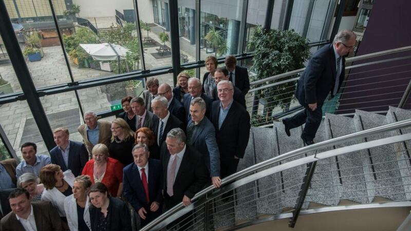 Had enough? Former Labour Leader Pat Rabbitte  leaves the party group photograph a bit early during the party’s pre-autumn parliamentary meeting  at White’s Hotel, Wexford. Photograph: Brenda Fitzsimons/The Irish Times