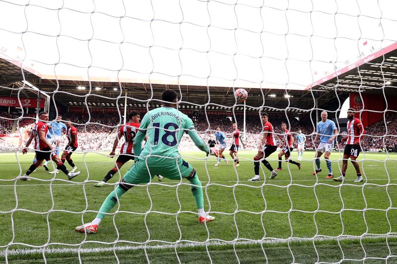 Manchester City's Spanish midfielder Rodri scores. Photograph: Darren Staples/AFP)