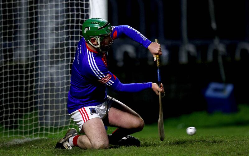 St. Thomas’ Gerald Kelly saves a penalty during the penalty shoot-out. Photograph: Ryan Byrne/Inpho