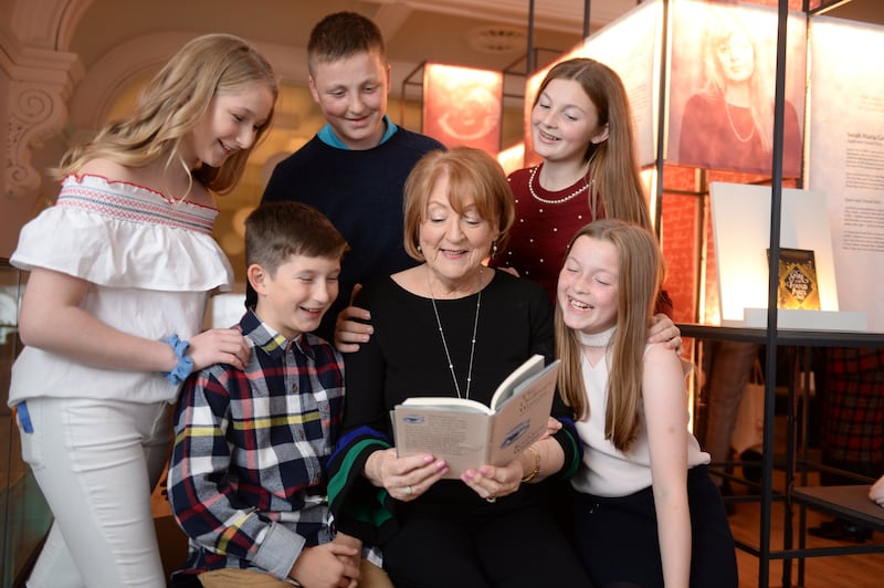 Kathleen Watkins at the launch of her book, The  Ordinary Woman and Other Poems I Love in 2019, pictured with her grandchildren from left; Kate, Harry, Cian, Sadhbh and Saoirse. Photograph: Dara Mac Dónaill