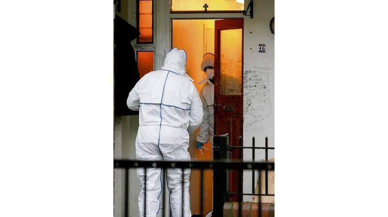 Gardaí at Pearse House flats the scene of a double murder on Sunday evening. Photograph: Cyril Byrne Inset: Paddy Mooney: murdered along with Brendan Molyneux.