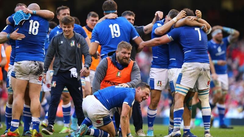 Paolo Garbisi (on floor) cannot hide his emotion after knocking over the winning conversion. Photograph:  Alex Livesey/Federugby/Getty Images