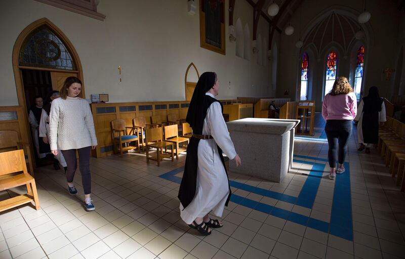 Call to prayer: Emma Brady, Sr Sarah and Grace McCann, a graduate of All Hallows College in Dublin, at Glencairn Abbey. Photograph: Valerie O’Sullivan