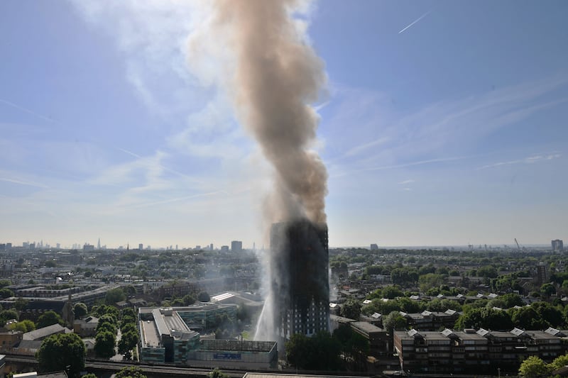 Smoke billows from the 24-storey Grenfell Tower in west London following a fire that claimed 72 lives