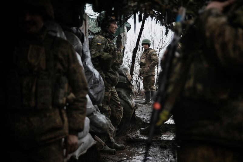 Ukrainian troops in a trench in the Donetsk region on January 19th. Photograph: Tyler Hicks/New York Times
                      