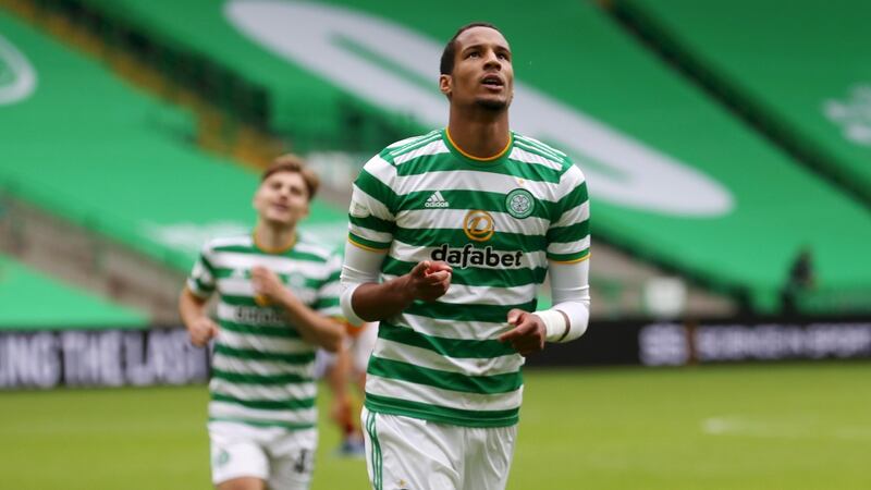 Christopher Jullien celebrates after scoring Celtic’s third against Motherwell. Photograph: Ian MacNicol/Getty